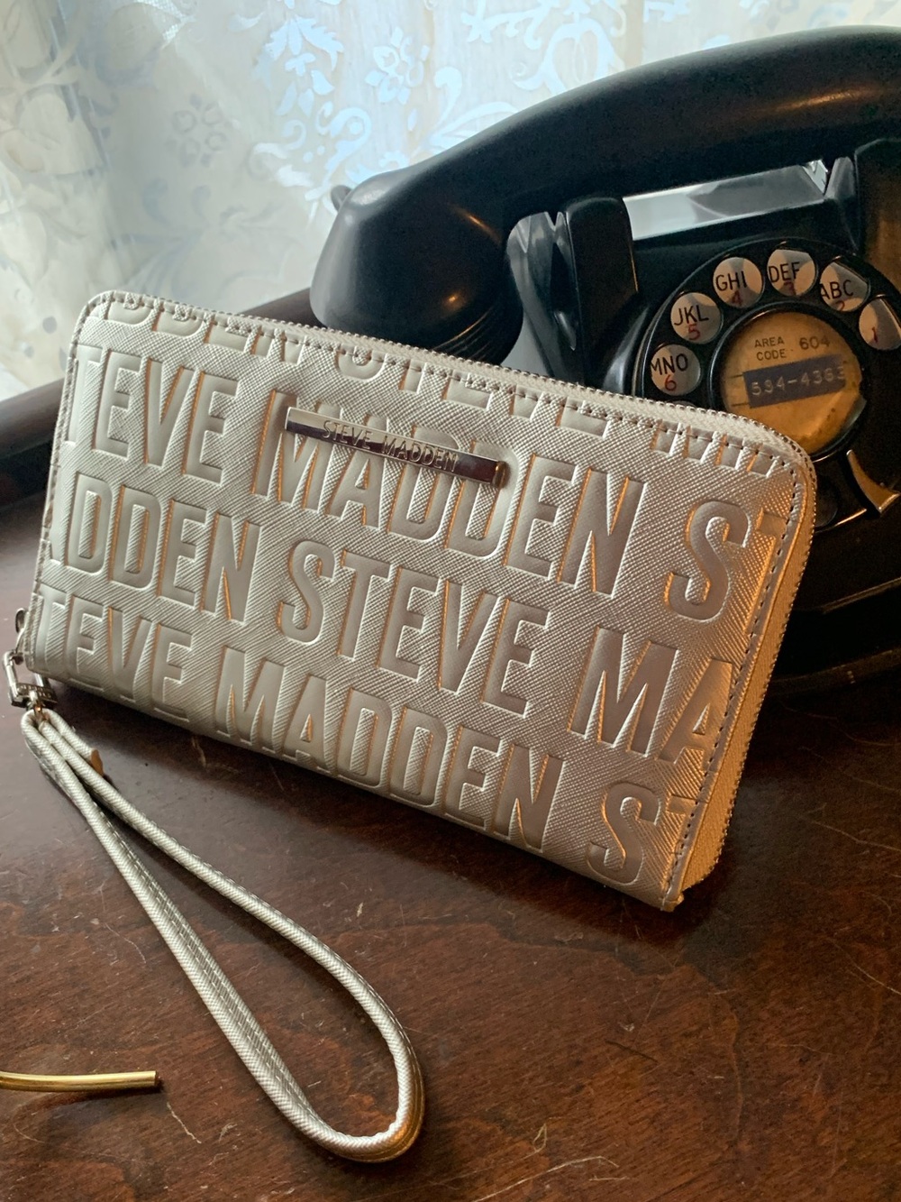 Steve Madden Authentic Silver Large wristlet.